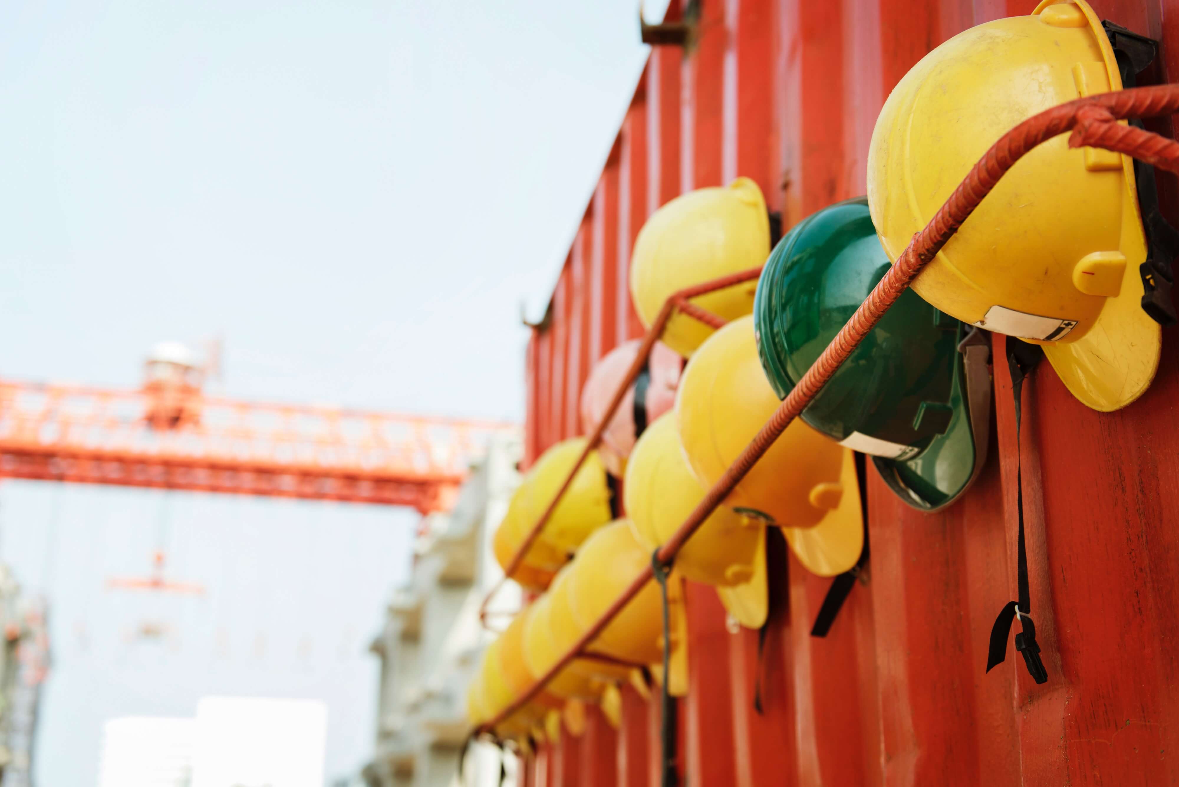 Yellow hats at a construction site - Unsplash.com