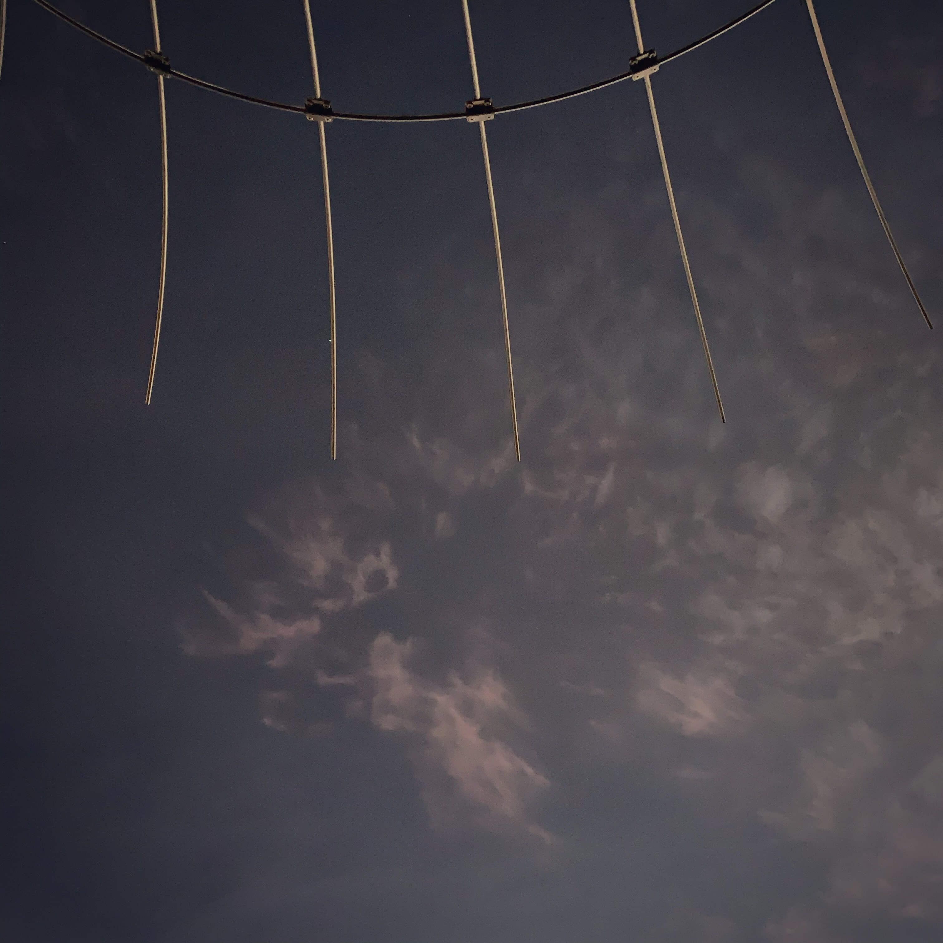 Sun setting as light clouds pass by, Canberra