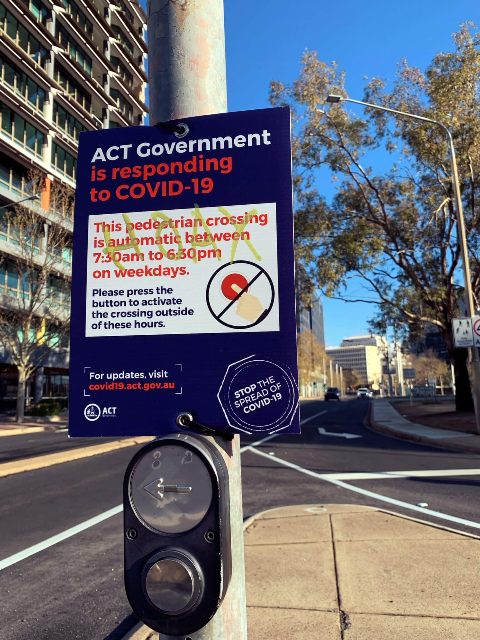 Sign on a pedestrian crossing, Canberra