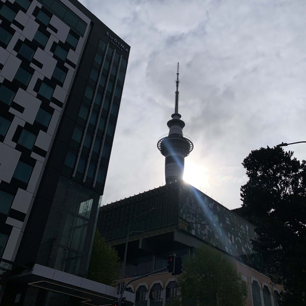 Photo of the sunlight reflecting off of the Skycity tower in Auckland. 