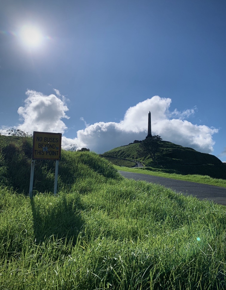 Photo of a sign board on the base of the One Tree Hill. The sign reads, “No buses beyond this point.”