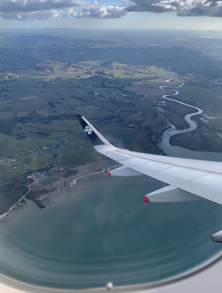 Photo of the New Zealand landscape as seen from the window of a plane. 